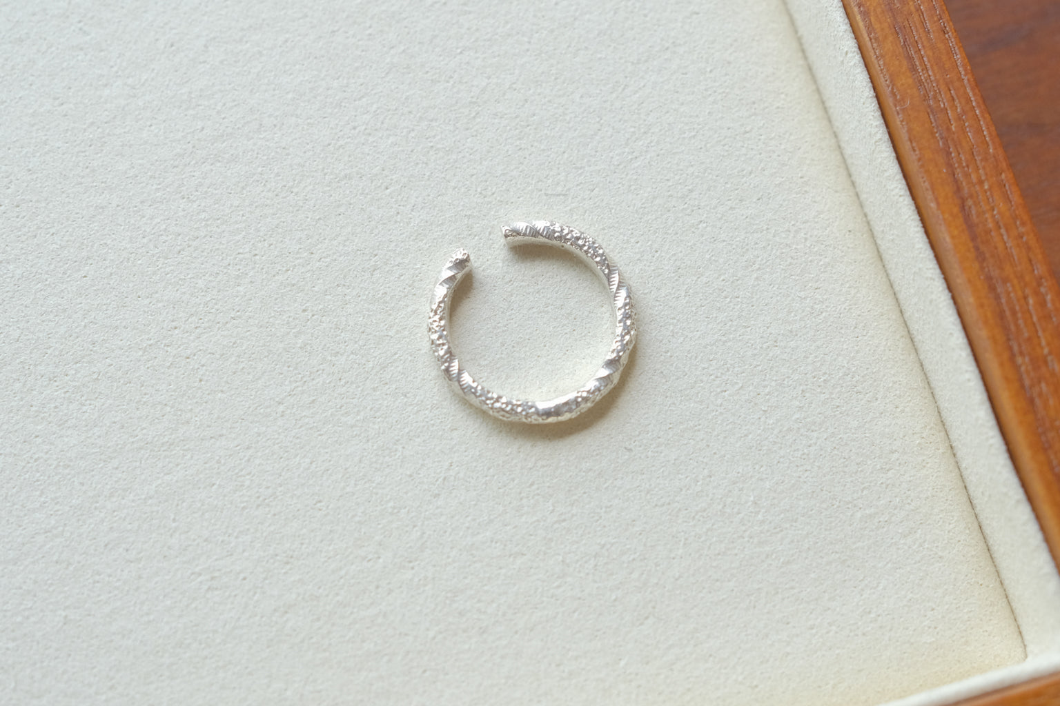 TEXTURED TWIST RING